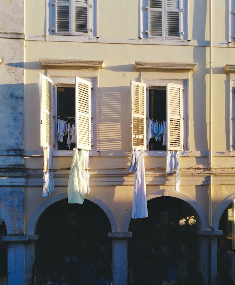 Clothes Hanged On Window