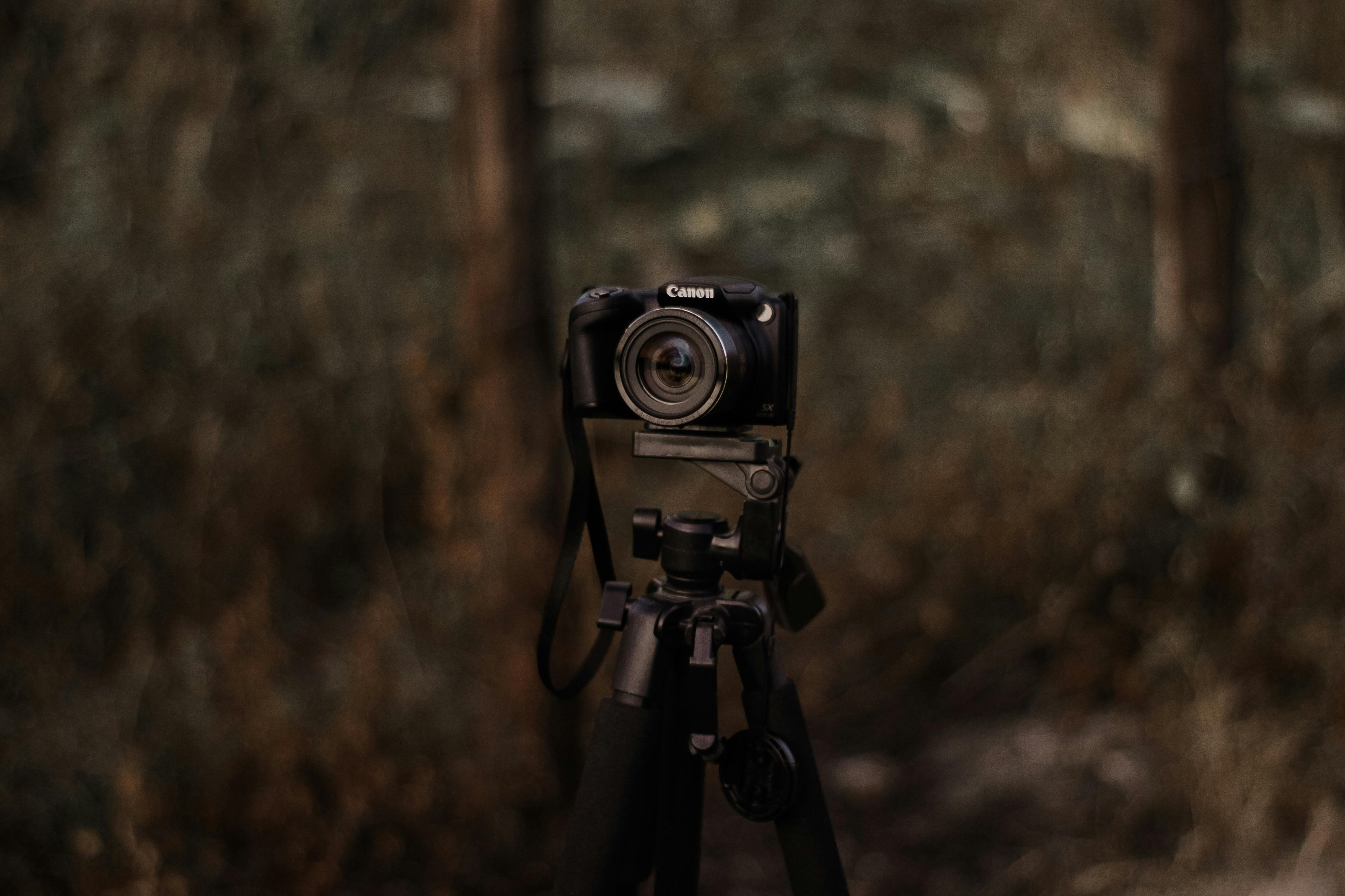 Shallow Focus Photo of Black Dslr Camera on Tripod · Free Stock Photo