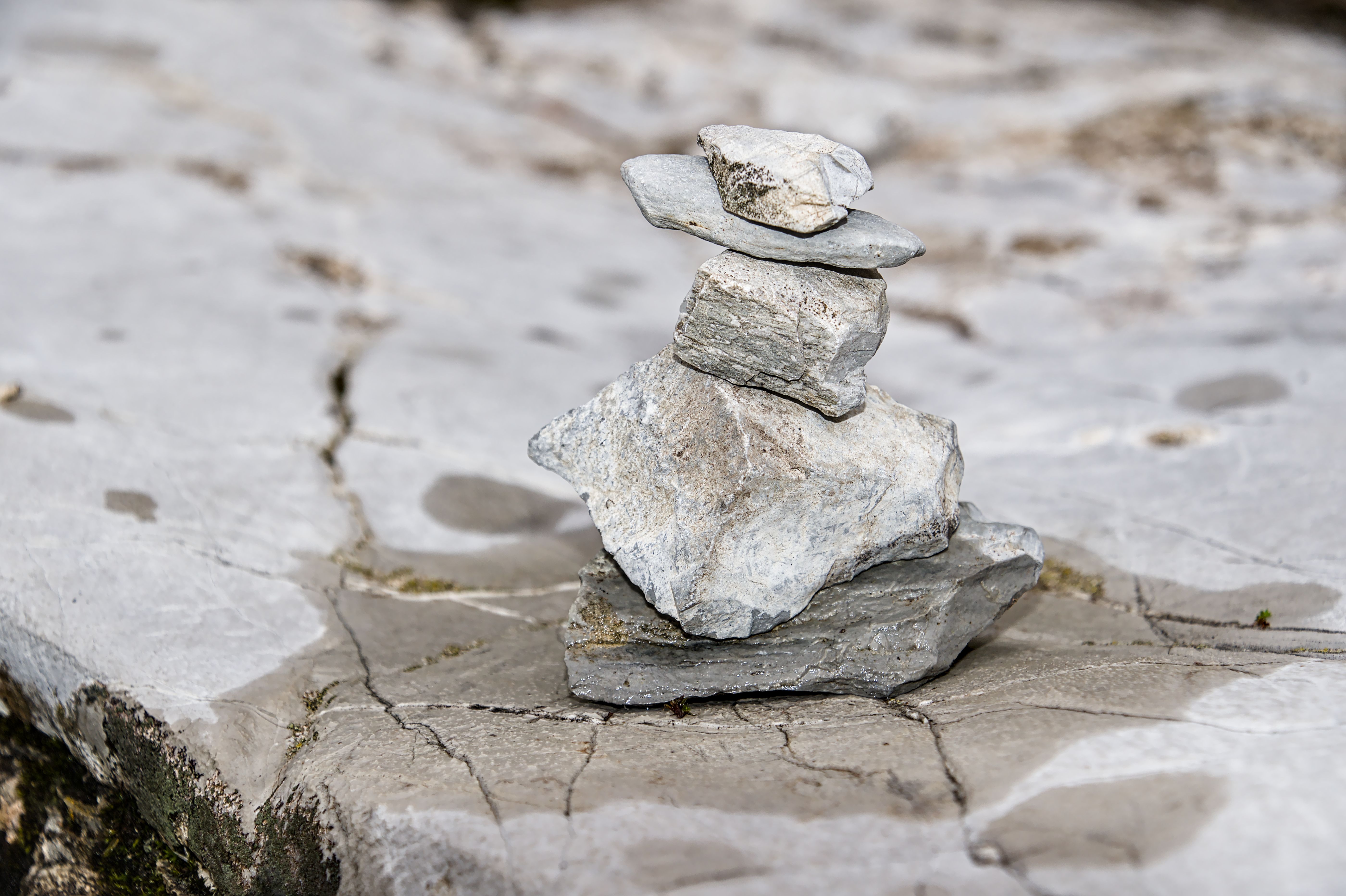 Image of a balanced stone sculpture, representing portfolio balance - wealth accumulation strategies