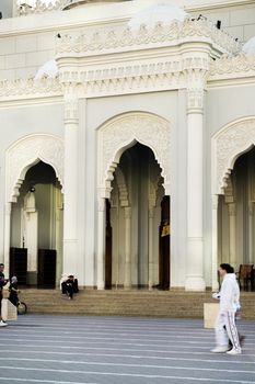Intricate architectural details of a mosque facade in Dubai, UAE.