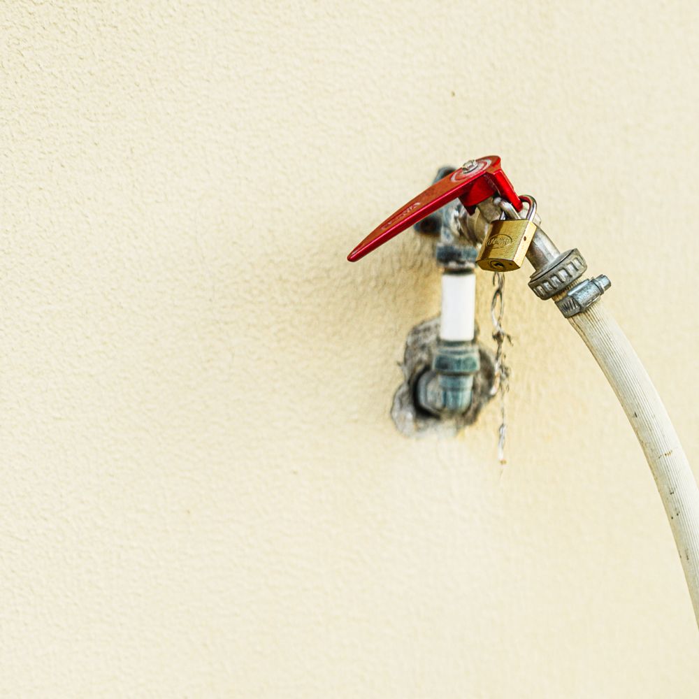 Kitchen Spraying in Acton — clean edges cut in around trim and sockets