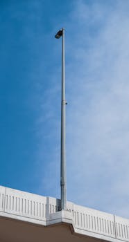 A street light pole on a modern building in Dubai, United Arab Emirates.