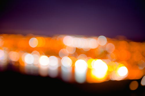 Free Bokeh Photography of White and Orange Lights Stock Photo