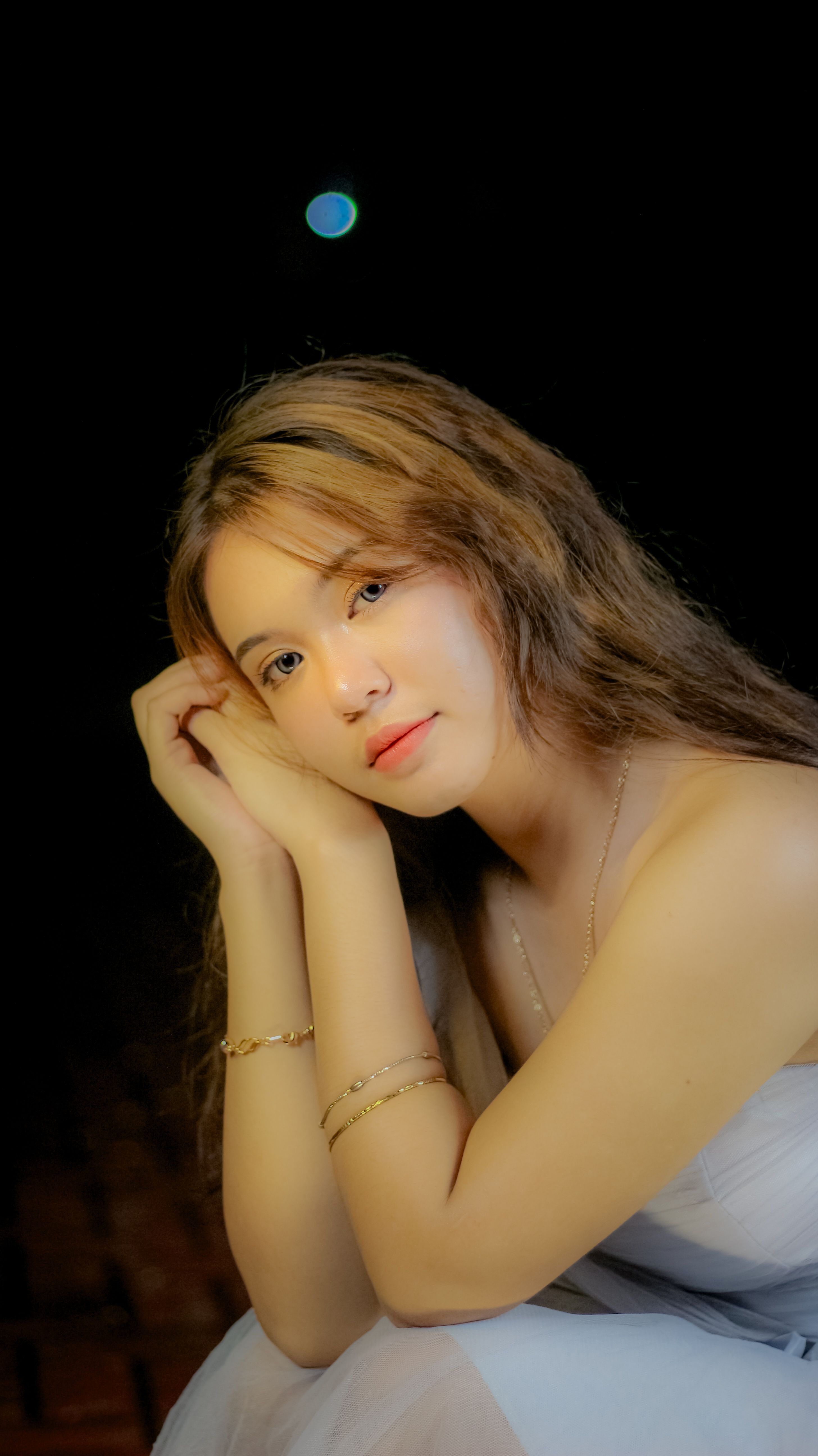 Portrait of a Young Woman in Soft Lighting · Free Stock Photo
