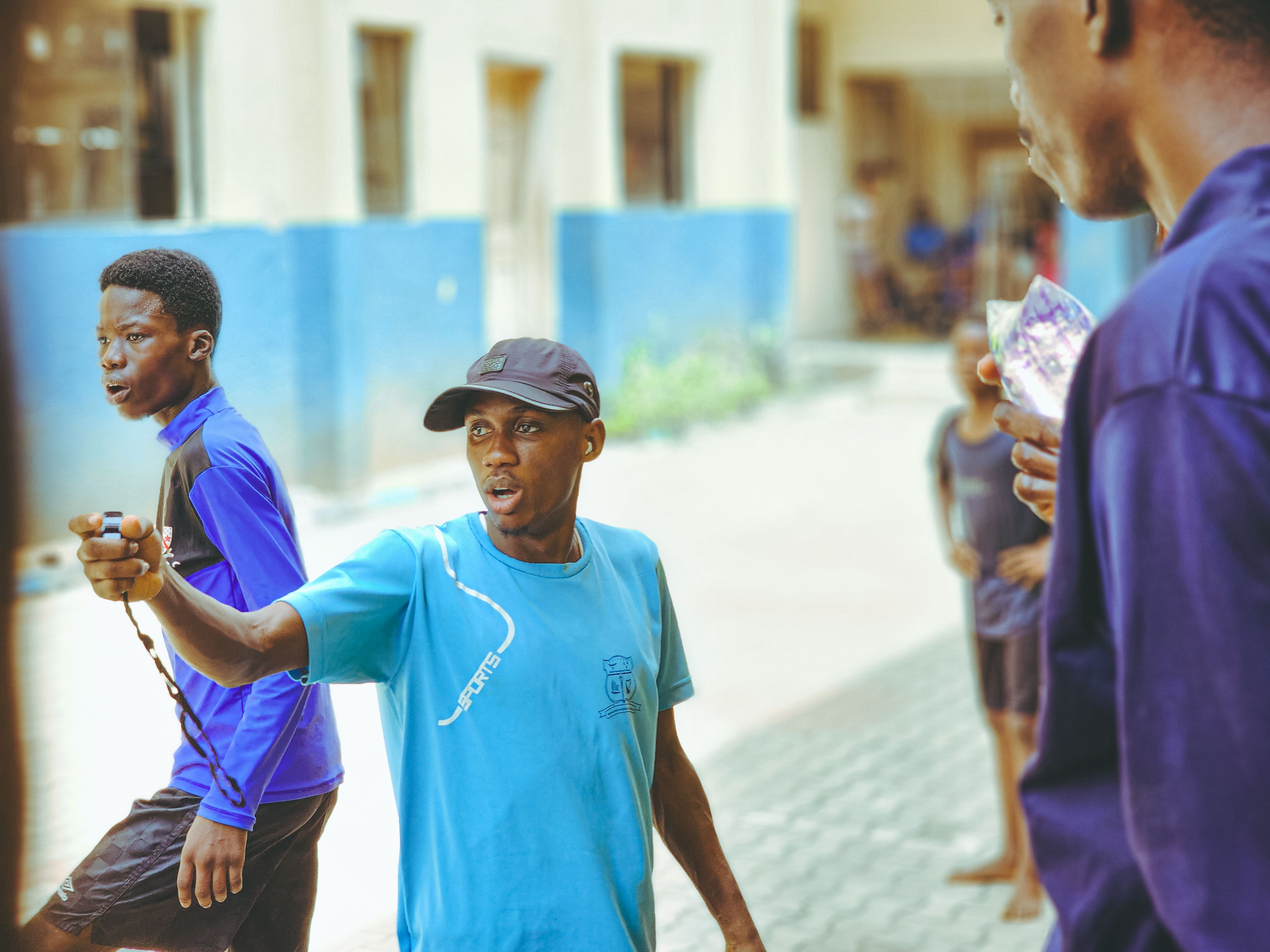 A group of young adults participating in dynamic outdoor activities, fostering teamwork and engagement.