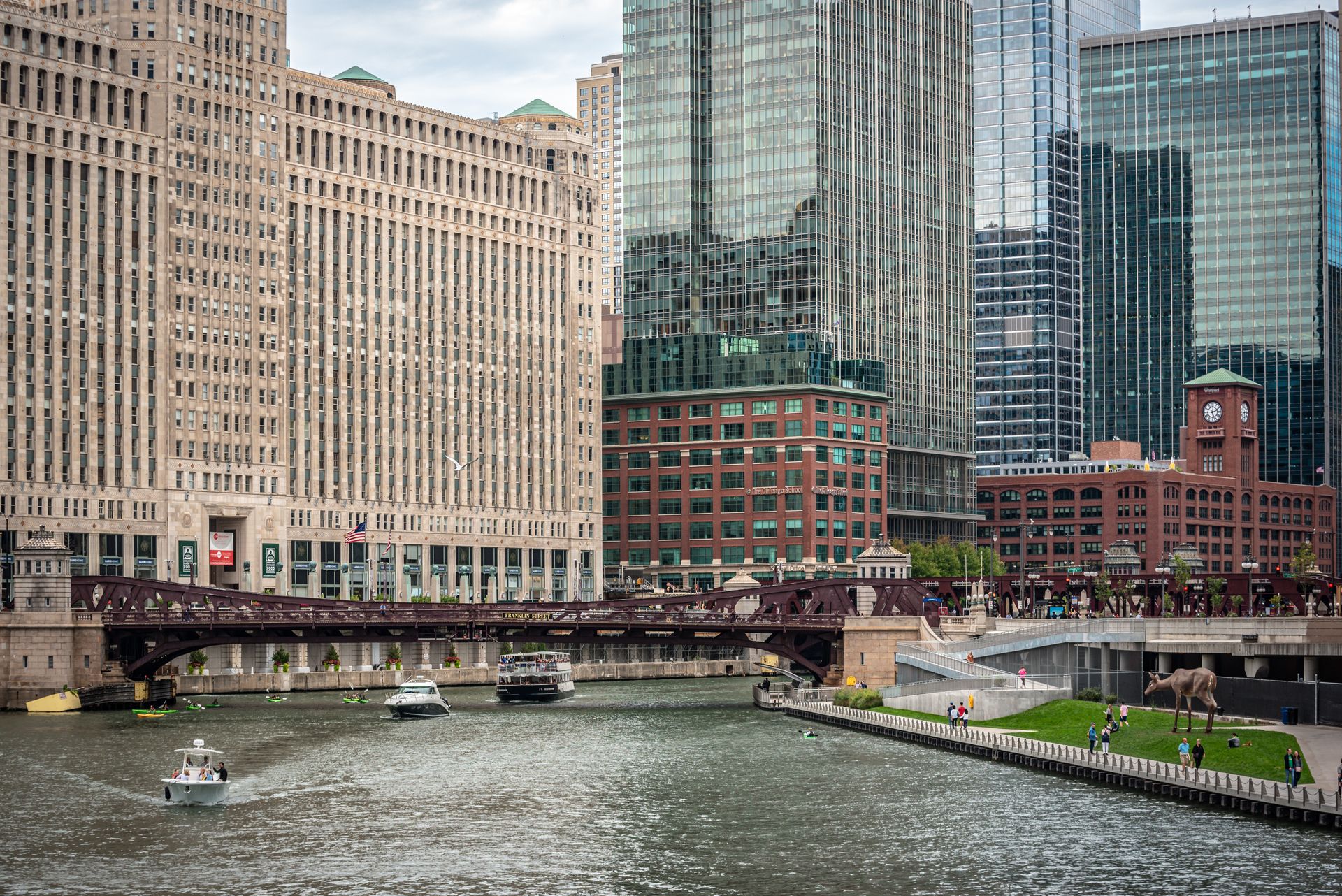 Explore the iconic buildings and serene river view in downtown Chicago.