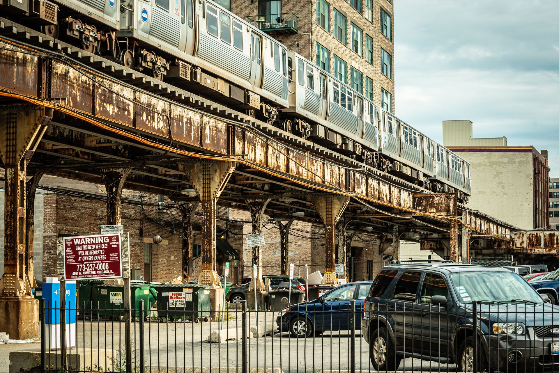 Rustic L train with urban elements in Chicago, Illinois.