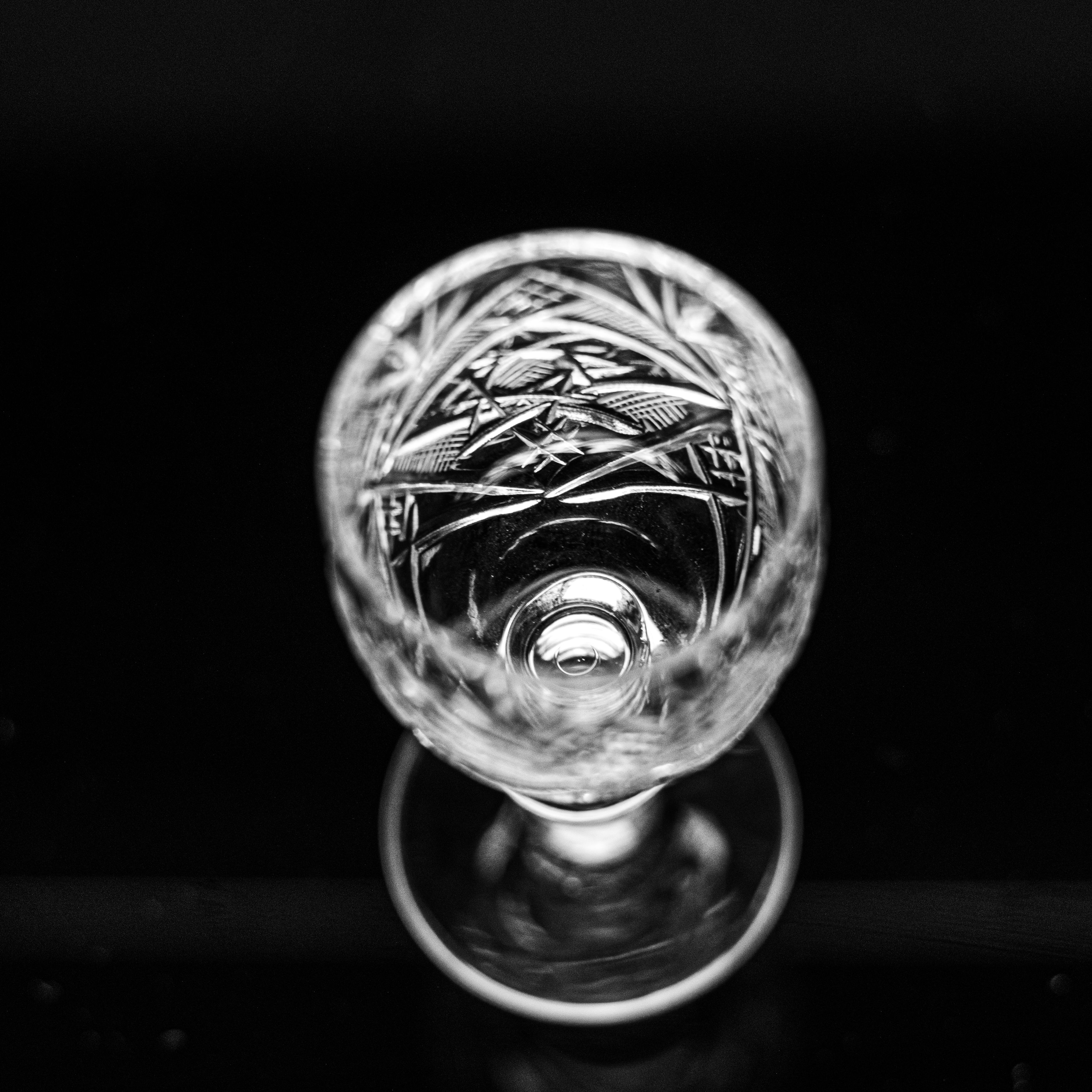 Ornate etched crystal glass photographed in black and white
