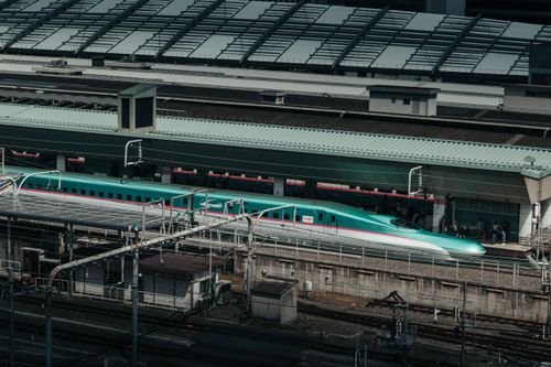 Free High-speed Shinkansen bullet train at Tokyo Station in Japan, showcasing modern transport. Stock Photo