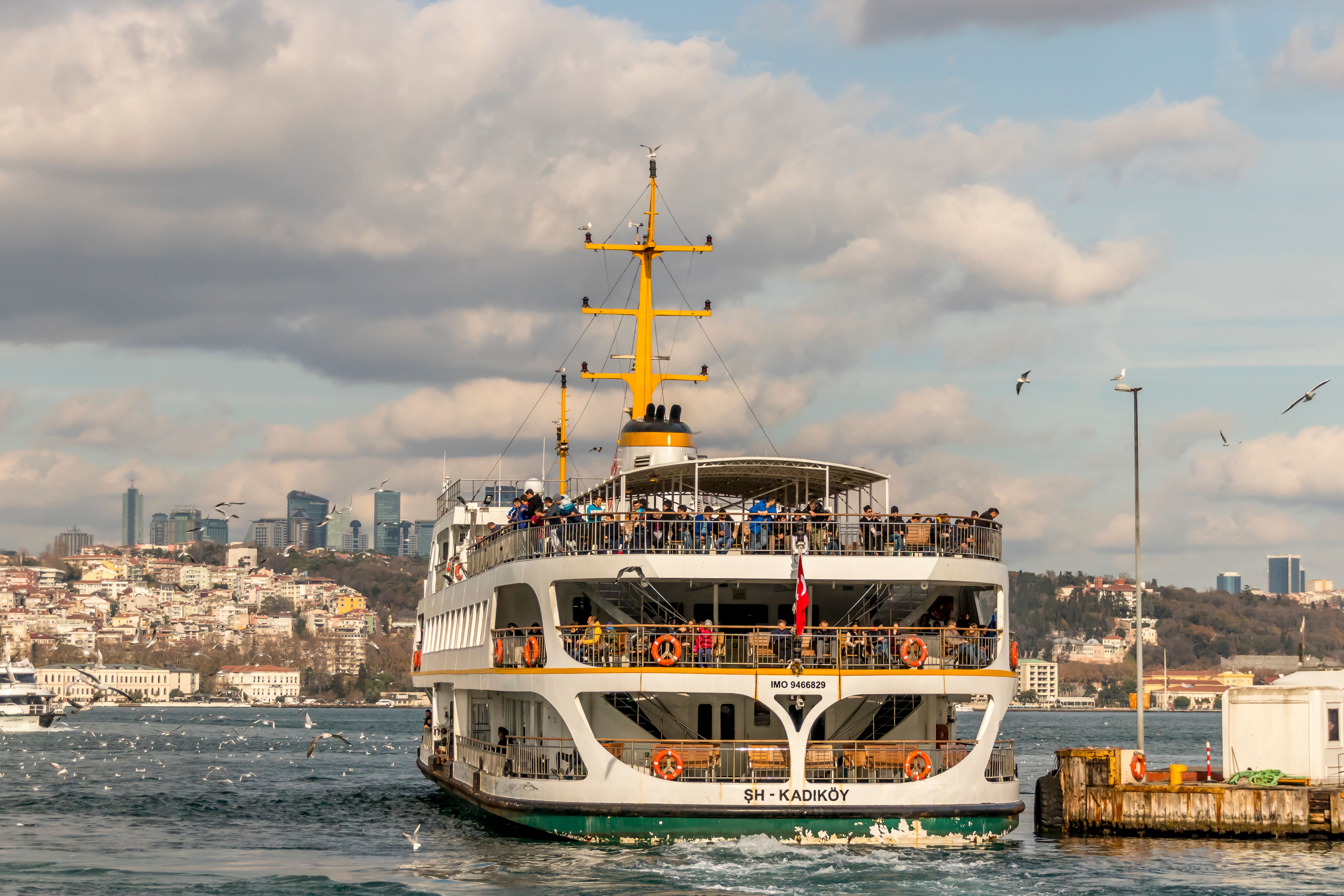 Passenger Ferry on Bosphorus with Cityscape · Free Stock Photo