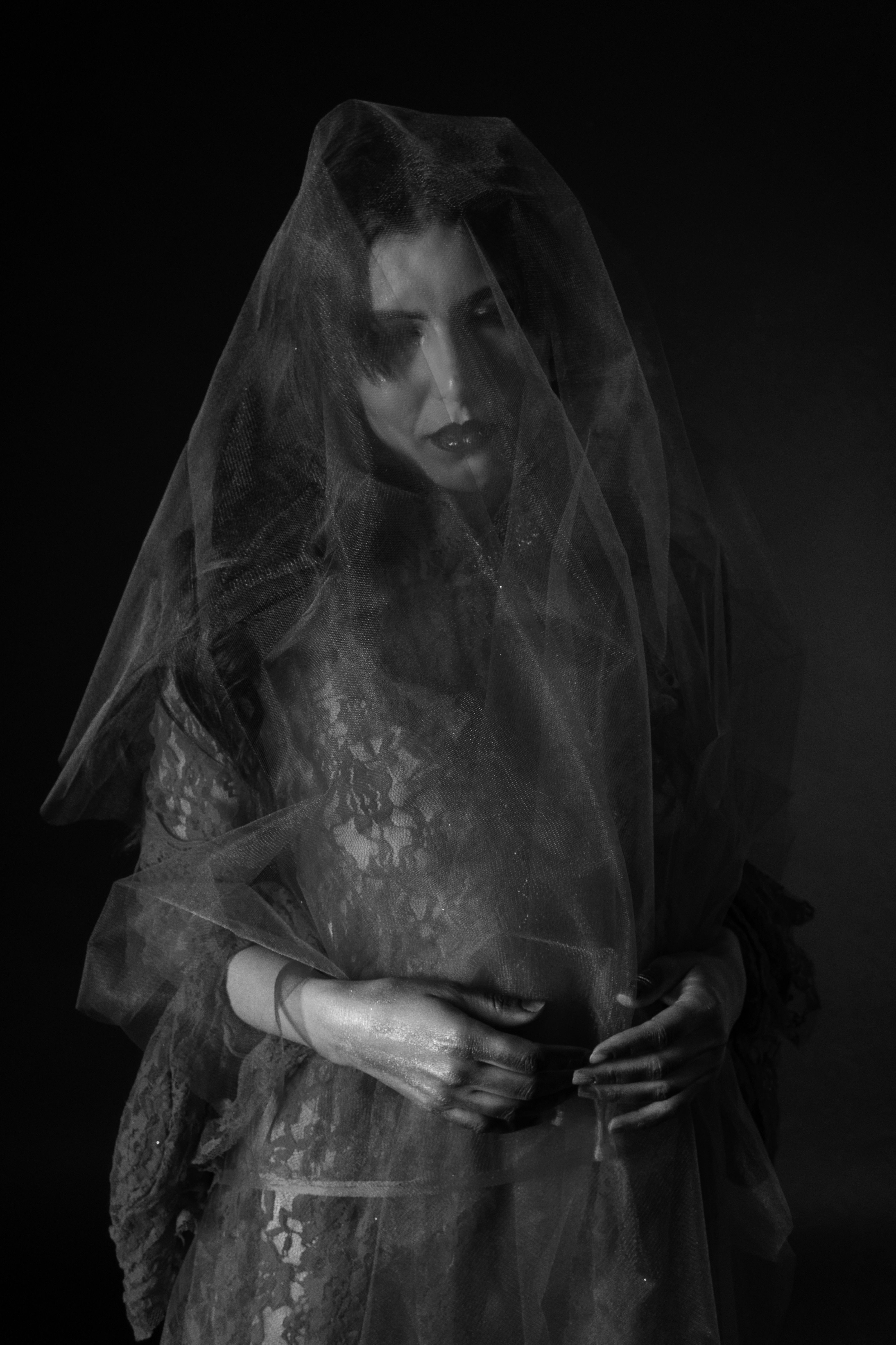 Moody Black and White Portrait of Woman with Veil · Free Stock Photo