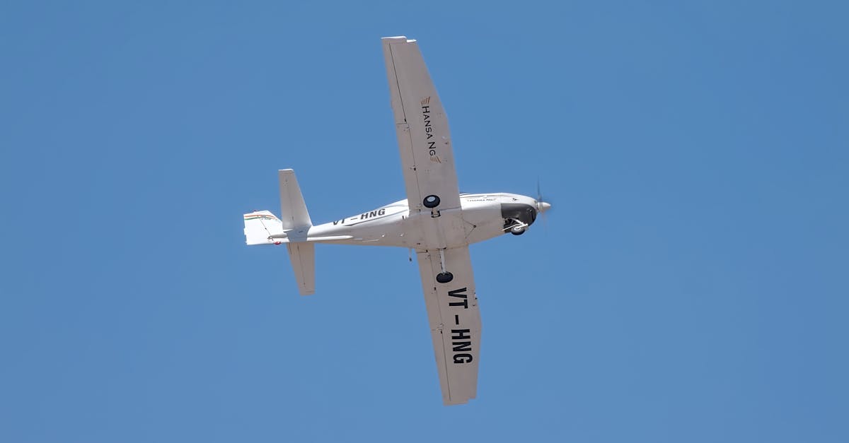 A light aircraft in flight featuring clear blue skies, captured in Bengaluru, India.