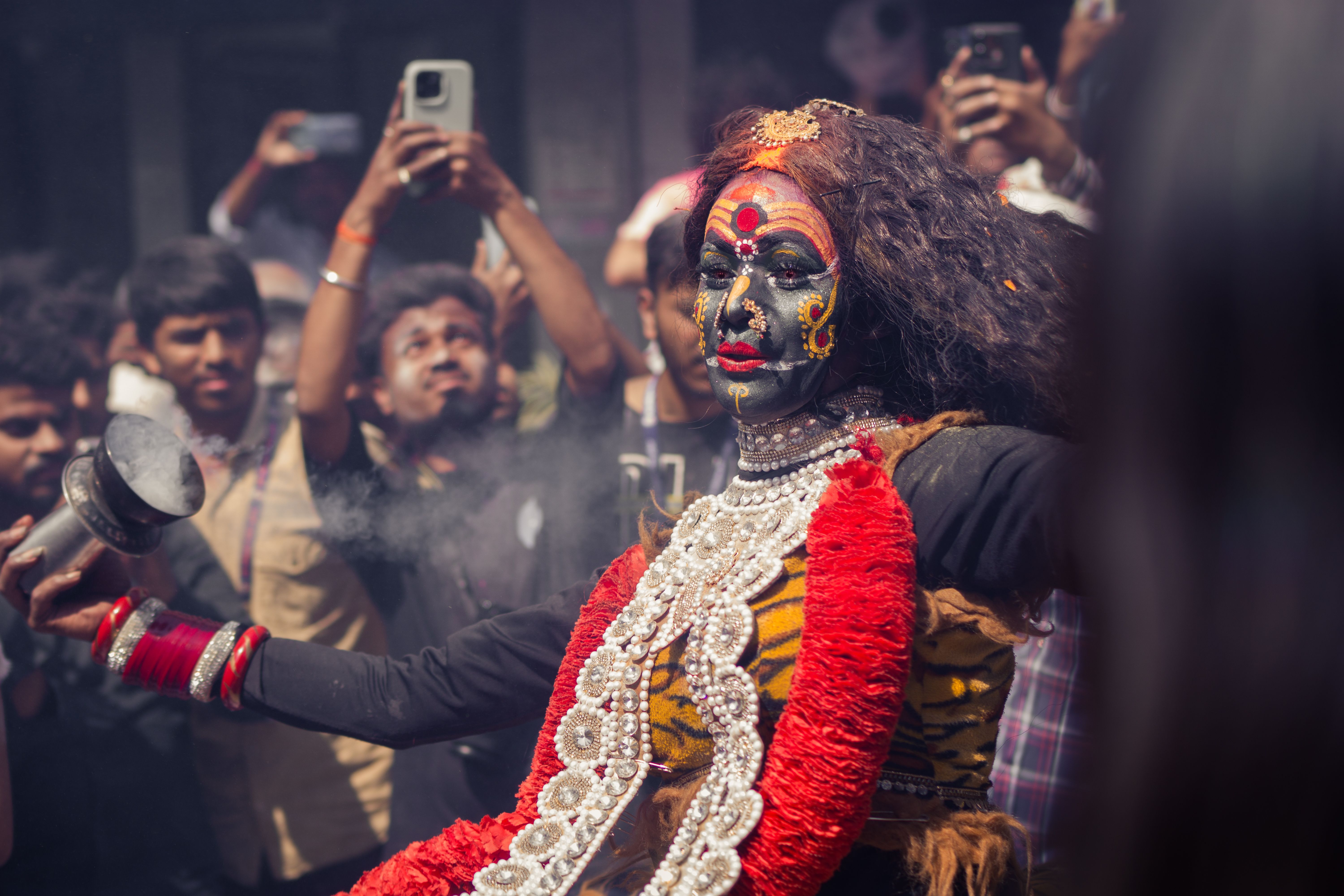 A captivating dance performance during a vibrant Hindu festival in Varanasi, India.