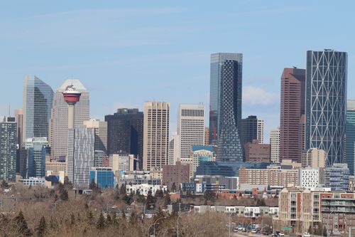 Free A stunning view of Calgary's skyline featuring the iconic Calgary Tower against a clear sky. Stock Photo