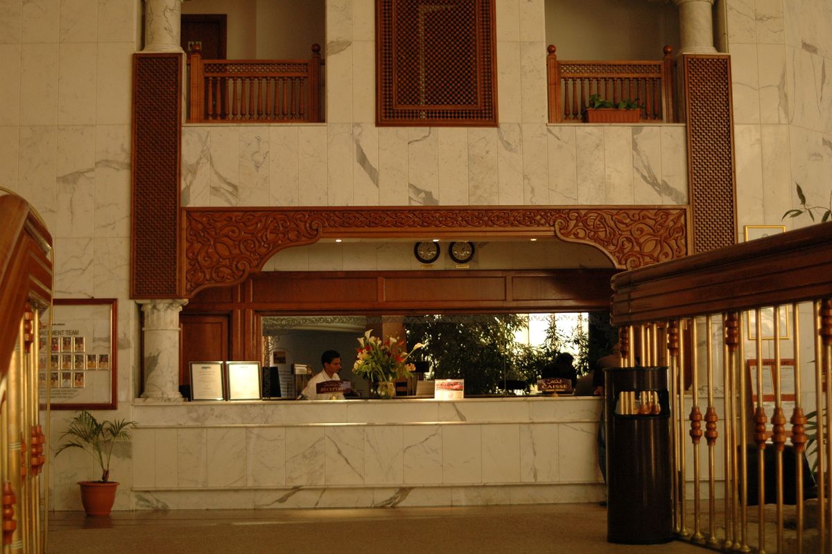 Hotel reception area with a check in desk