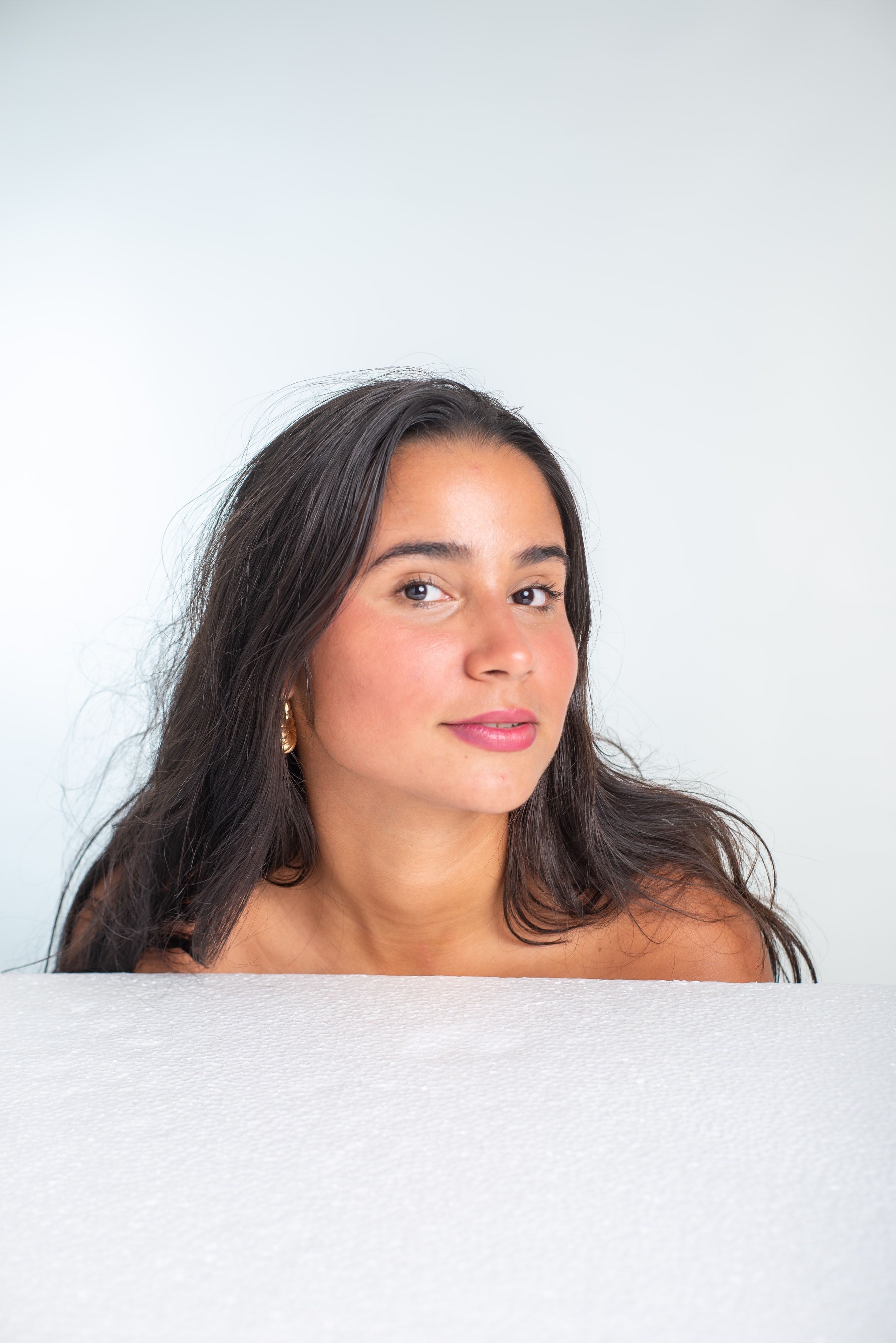 Elegant Portrait of a Woman with Long Hair · Free Stock Photo