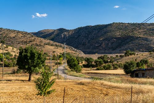 Free Beautiful rural landscape in Kemaliye, Erzincan, Turkey with mountains and fields. Stock Photo