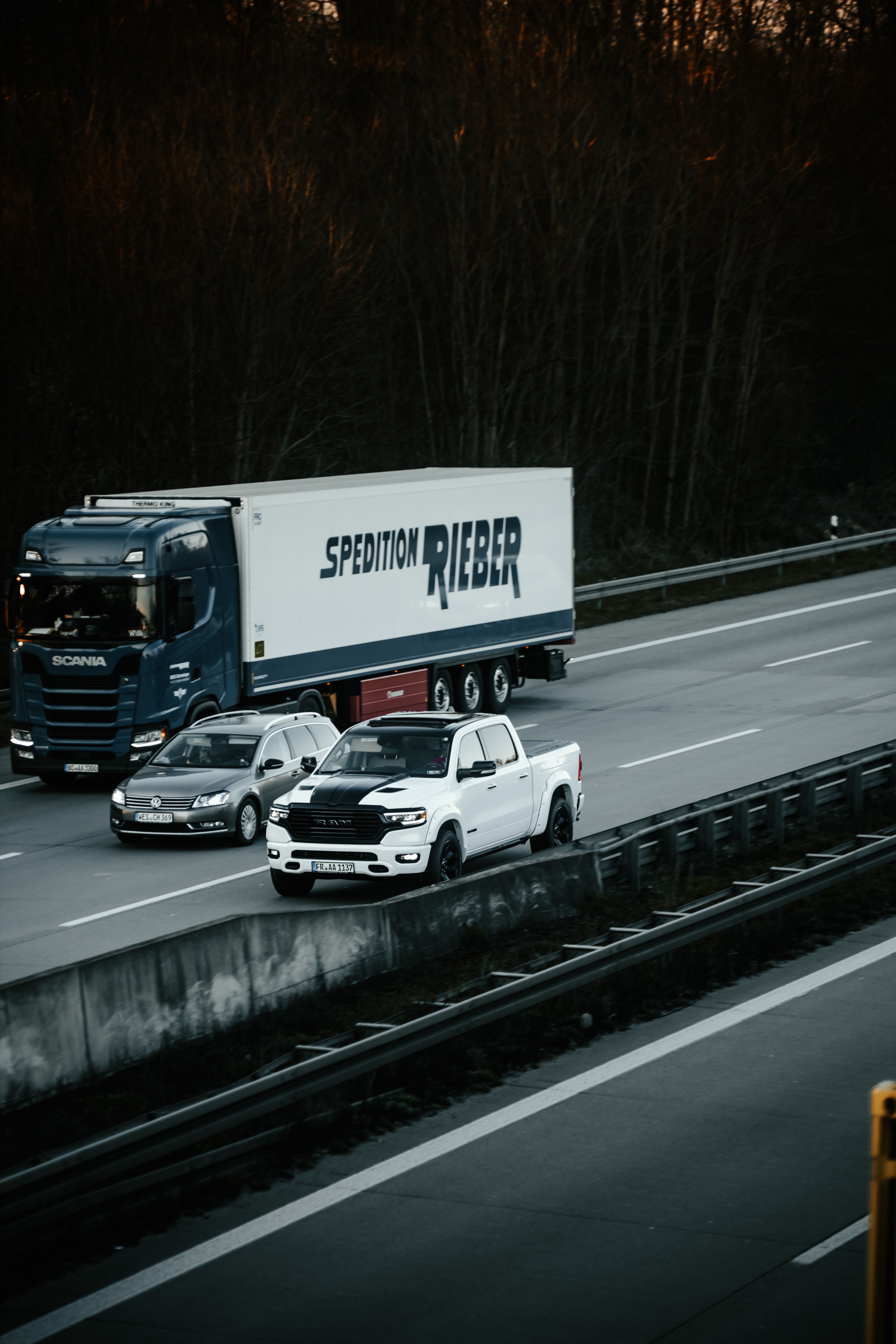 Dynamic Highway Scene with Trucks and Cars · Free Stock Photo