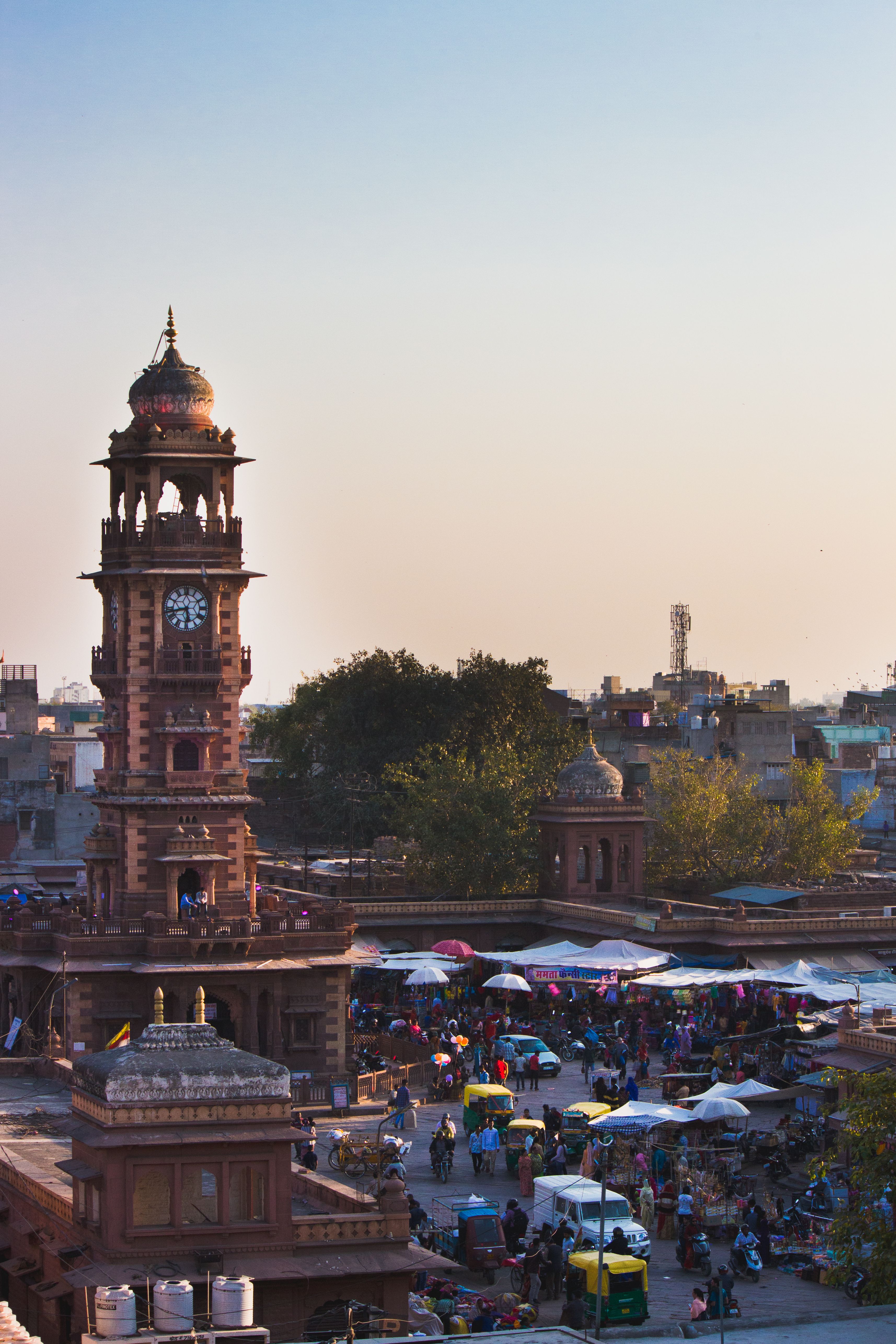 Bustling evening market at Jodhpur's iconic Clock Tower, Rajasthan, India.