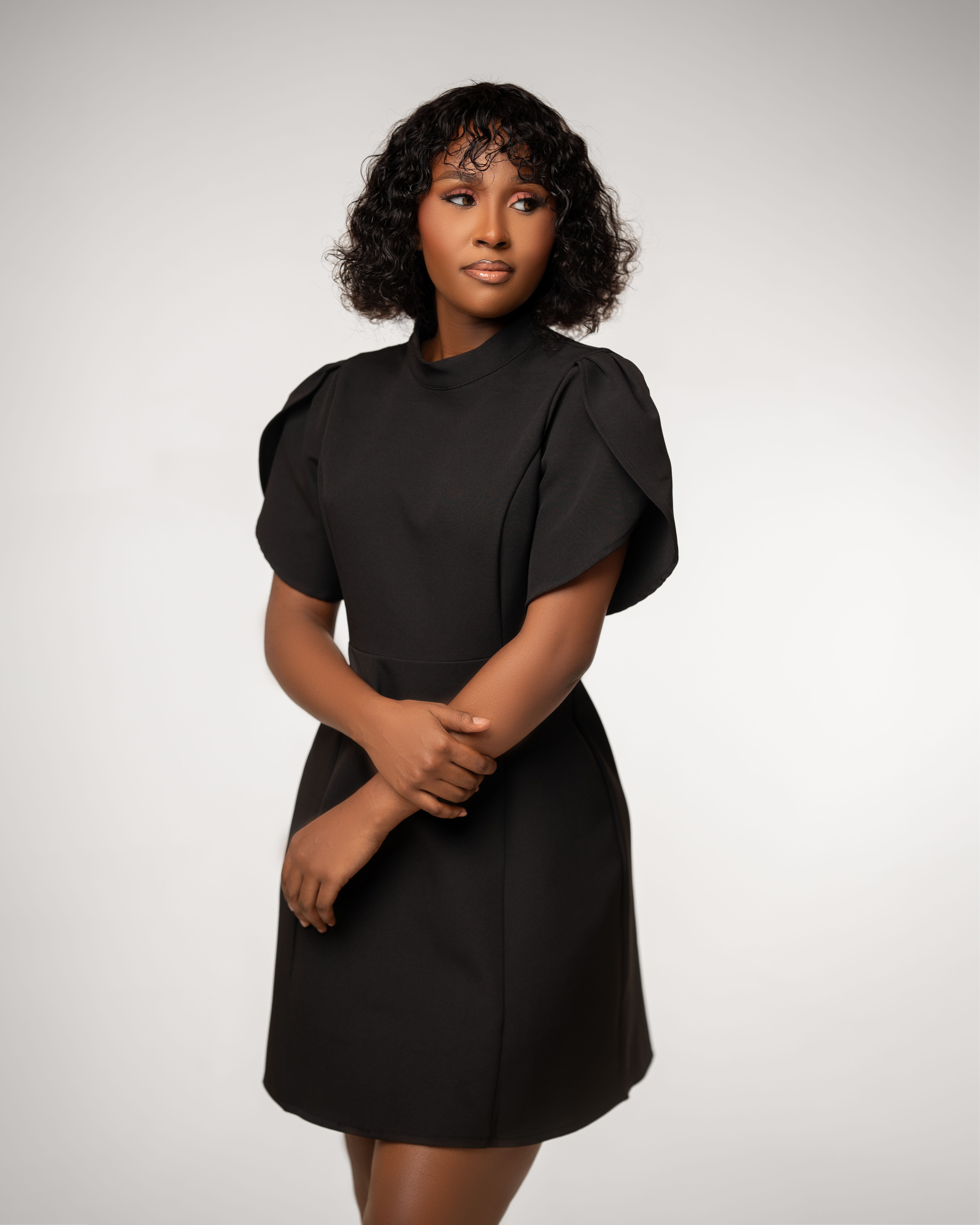 Elegant Portrait of Woman in Black Dress · Free Stock Photo