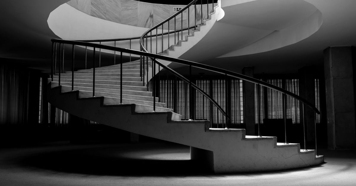 Elegant Spiral Staircase in Monochrome Interior · Free Stock Photo