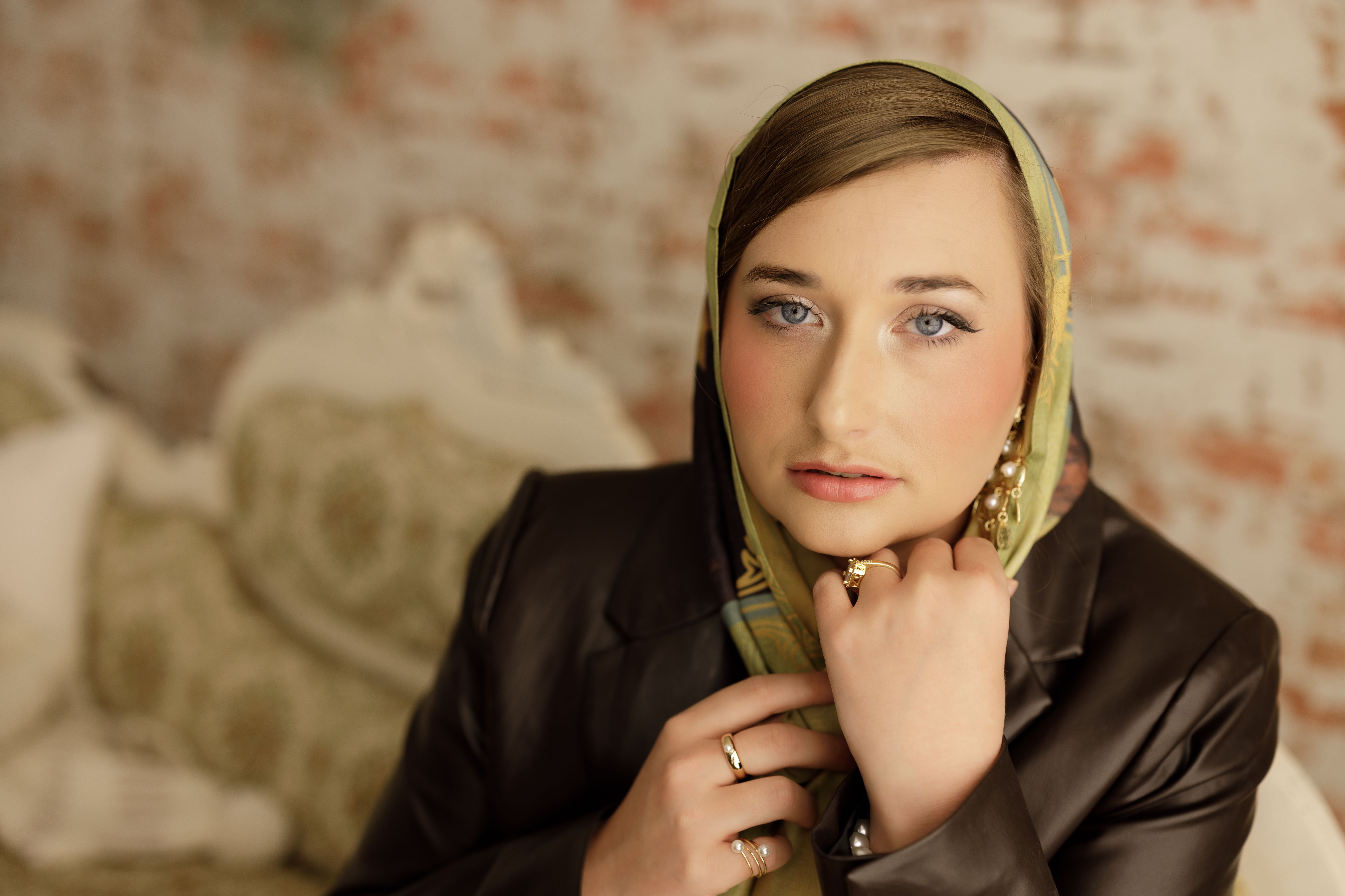 Elegant Portrait of a Woman in Headscarf Indoors · Free Stock Photo