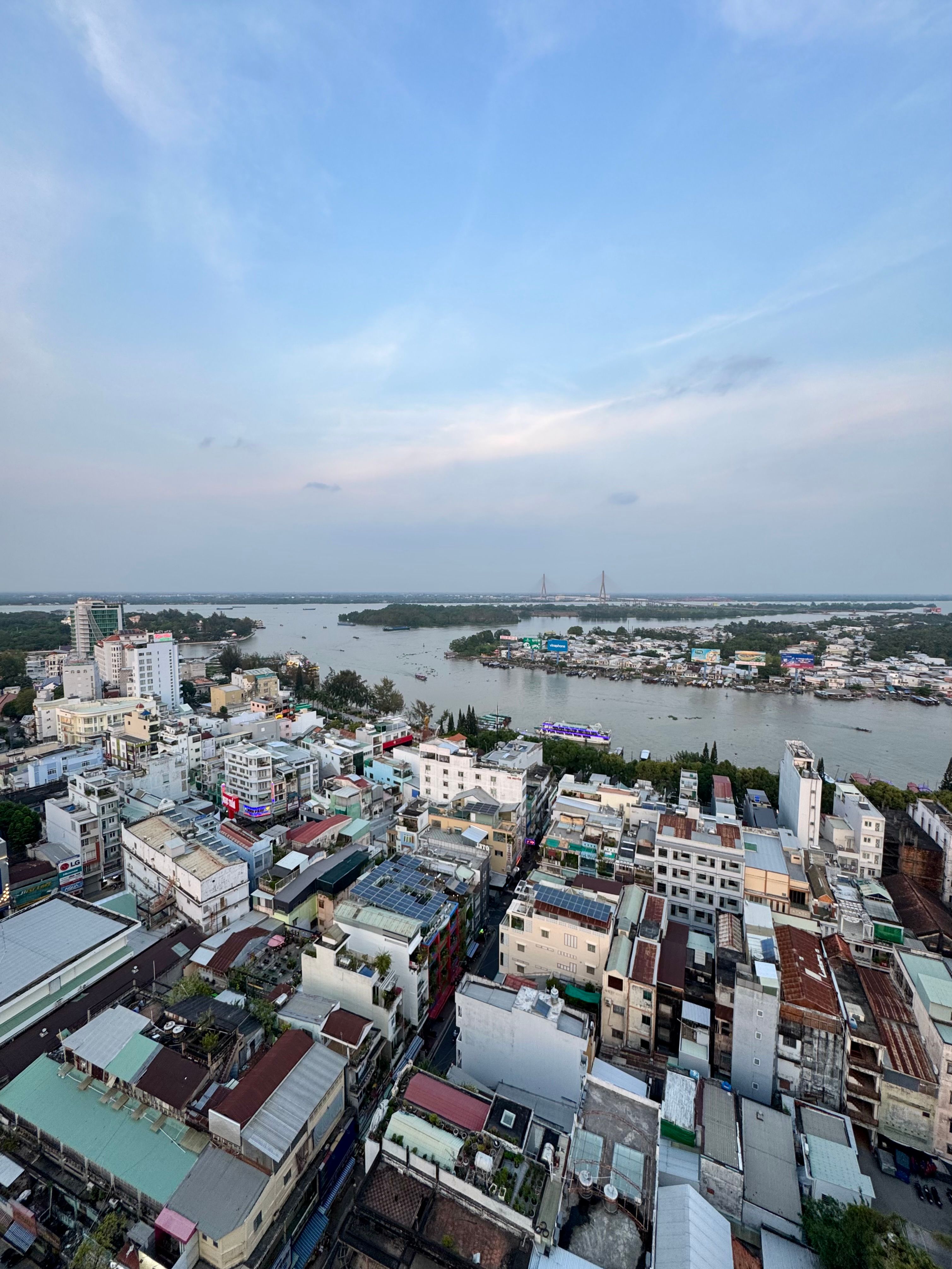 Aerial View of Riverside Cityscape at Dusk · Free Stock Photo