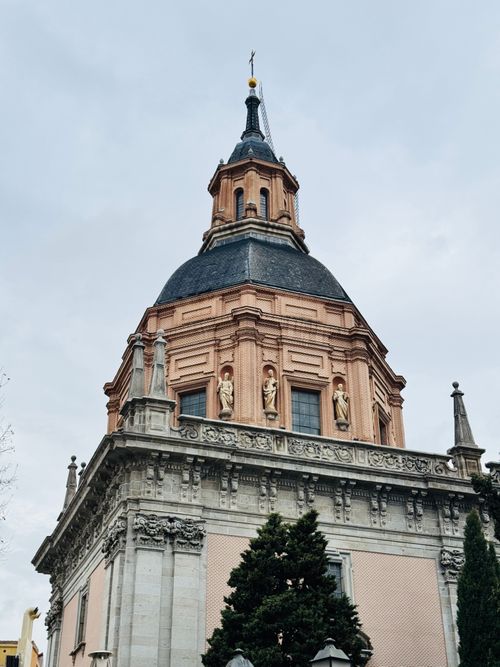 Free Stunning dome of a historic Spanish church against an overcast sky. Stock Photo