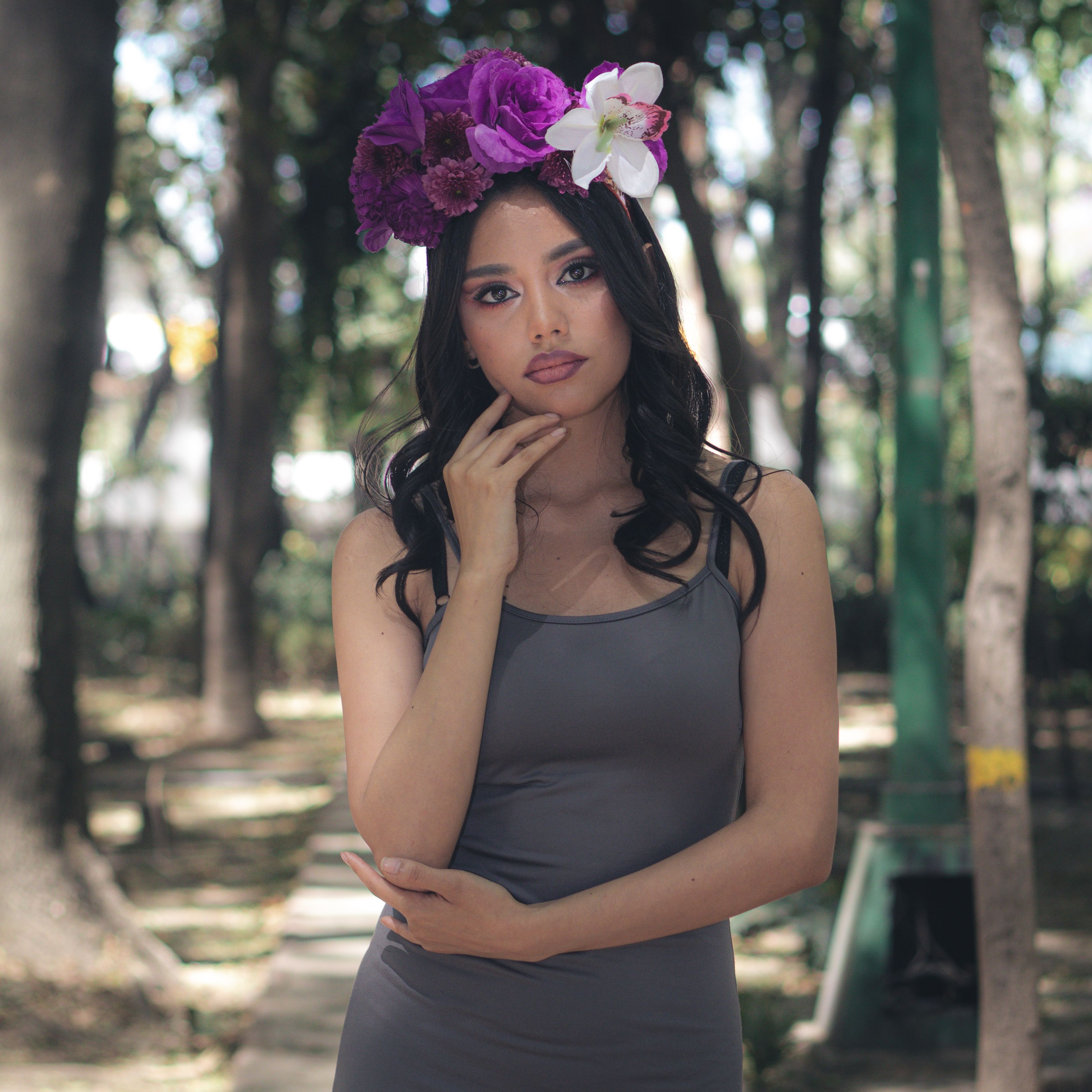 Portrait of Woman with Floral Headpiece Outdoors · Free Stock Photo