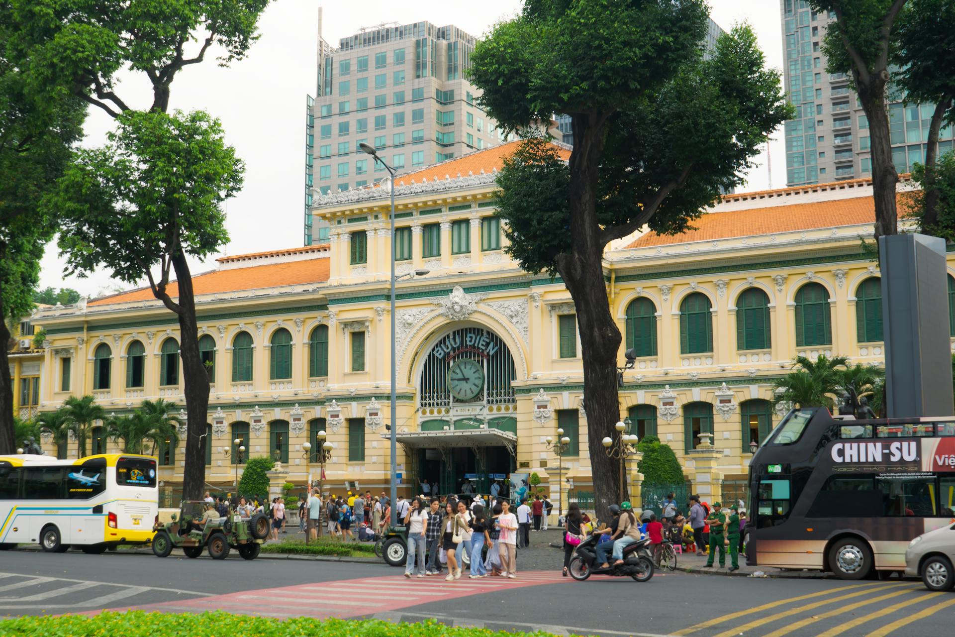 Bustling day at the historic Saigon Central Post Office, a French colonial landmark in Ho Chi Minh City.