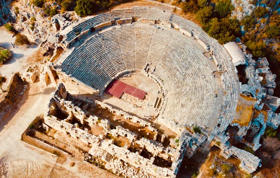 Explore the majestic aerial view of a well-preserved ancient Roman amphitheater.