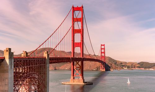Free A breathtaking view of the Golden Gate Bridge during sunset in San Francisco, showcasing its iconic silhouette. Stock Photo