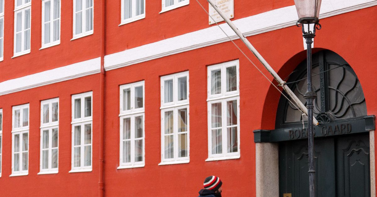 Denmark Red Copenhagen Red Building with Pedestrian · Free Stock Photo