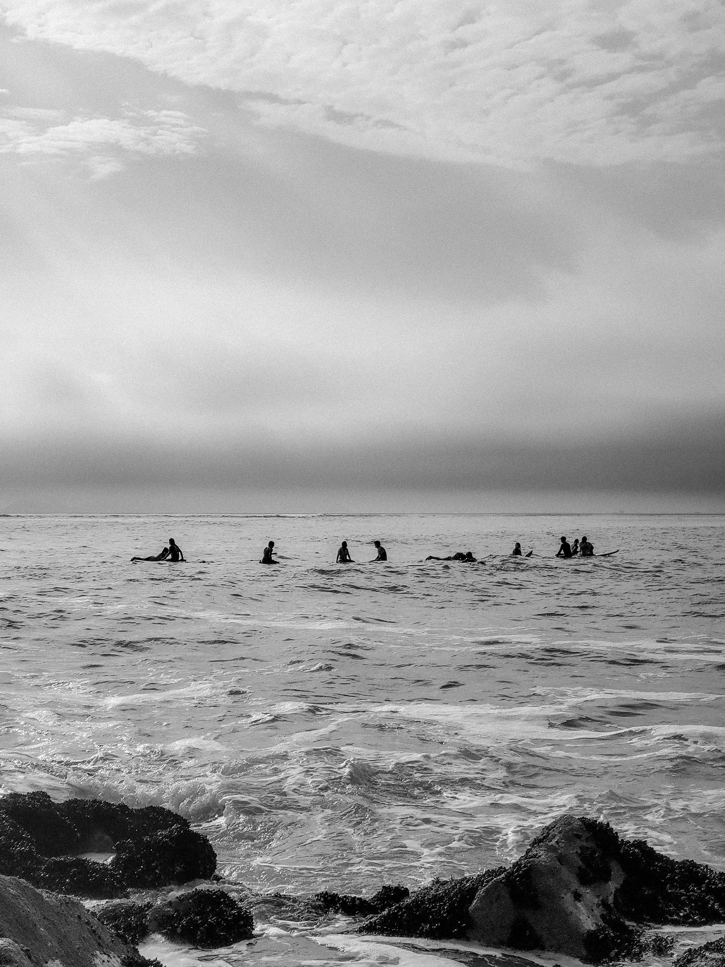 Black and White Ocean Adventure with Surfers · Free Stock Photo