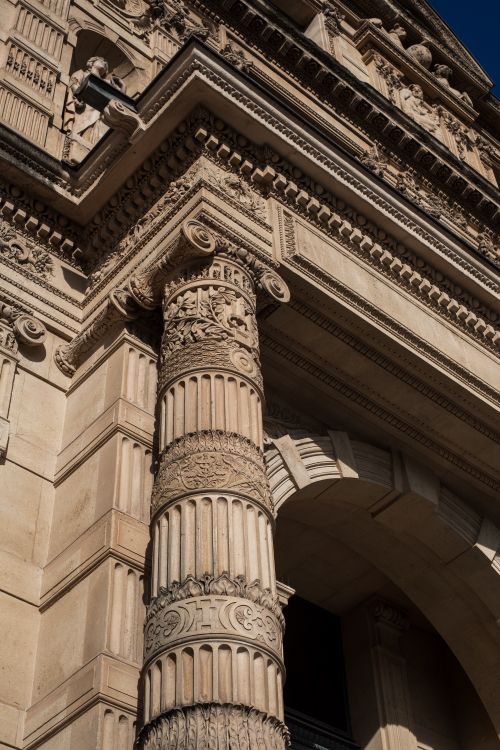 Free Close-up of a detailed stone column and facade, showcasing classic architecture. Stock Photo