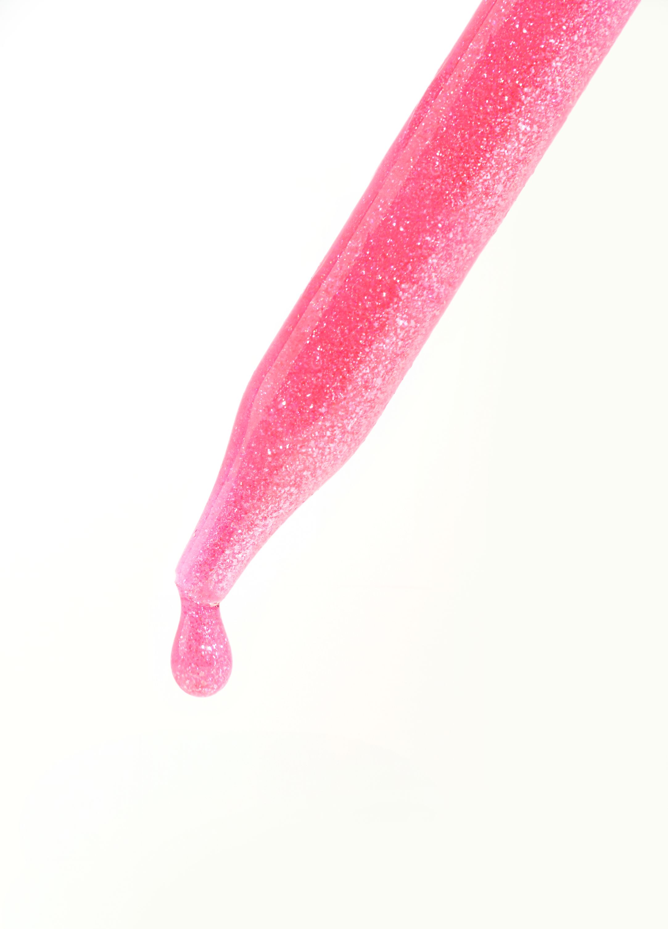 Close-up of Pink Glitter Dropper with Liquid Drop