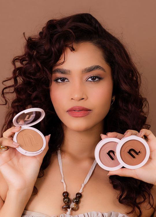 Beautiful Model Holding Makeup Compacts · Free Stock Photo