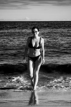 Captivating black and white portrait of a woman on a Porto Seguro beach.