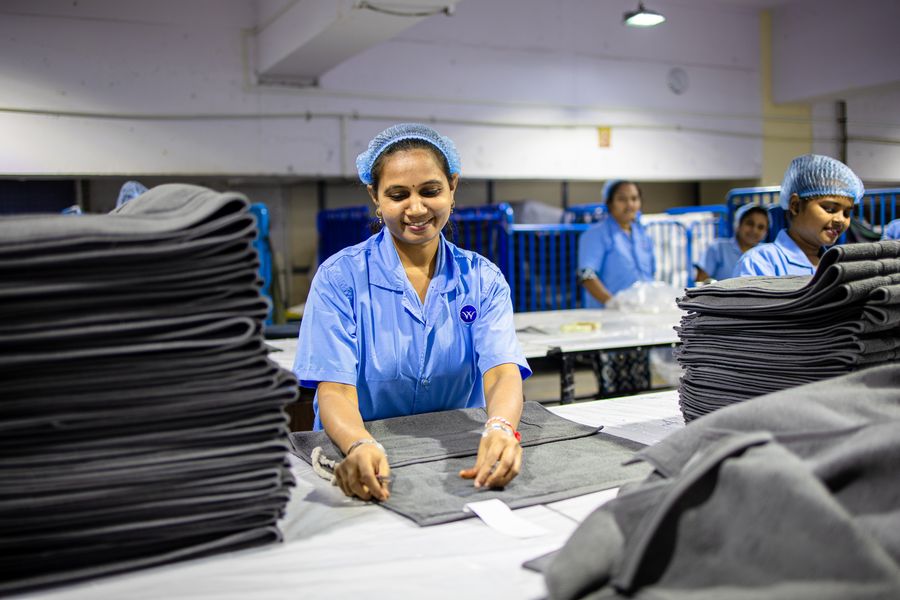 Sewing machine operators at our Pakistan garment factory