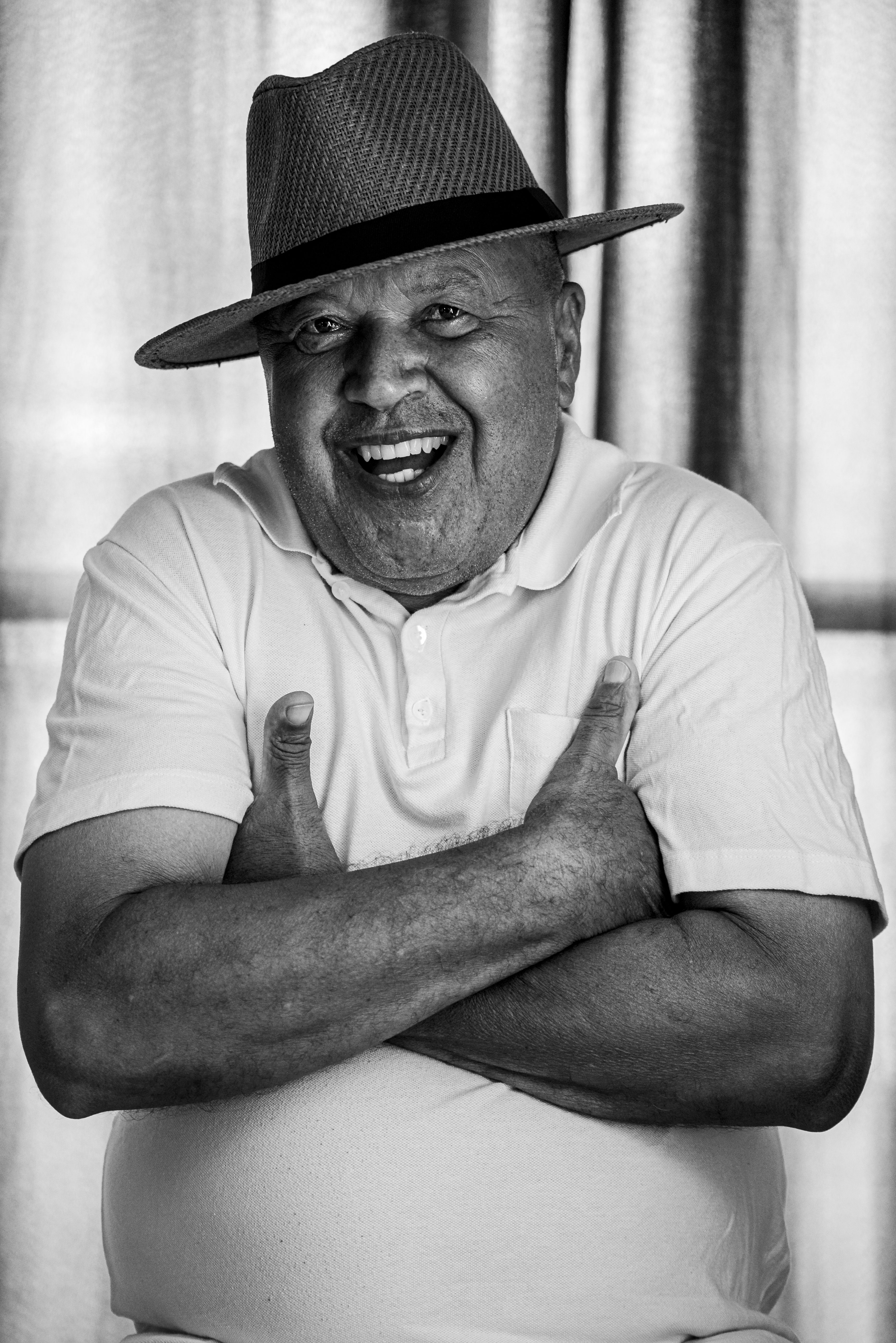 Smiling mature Latino man customer portrait