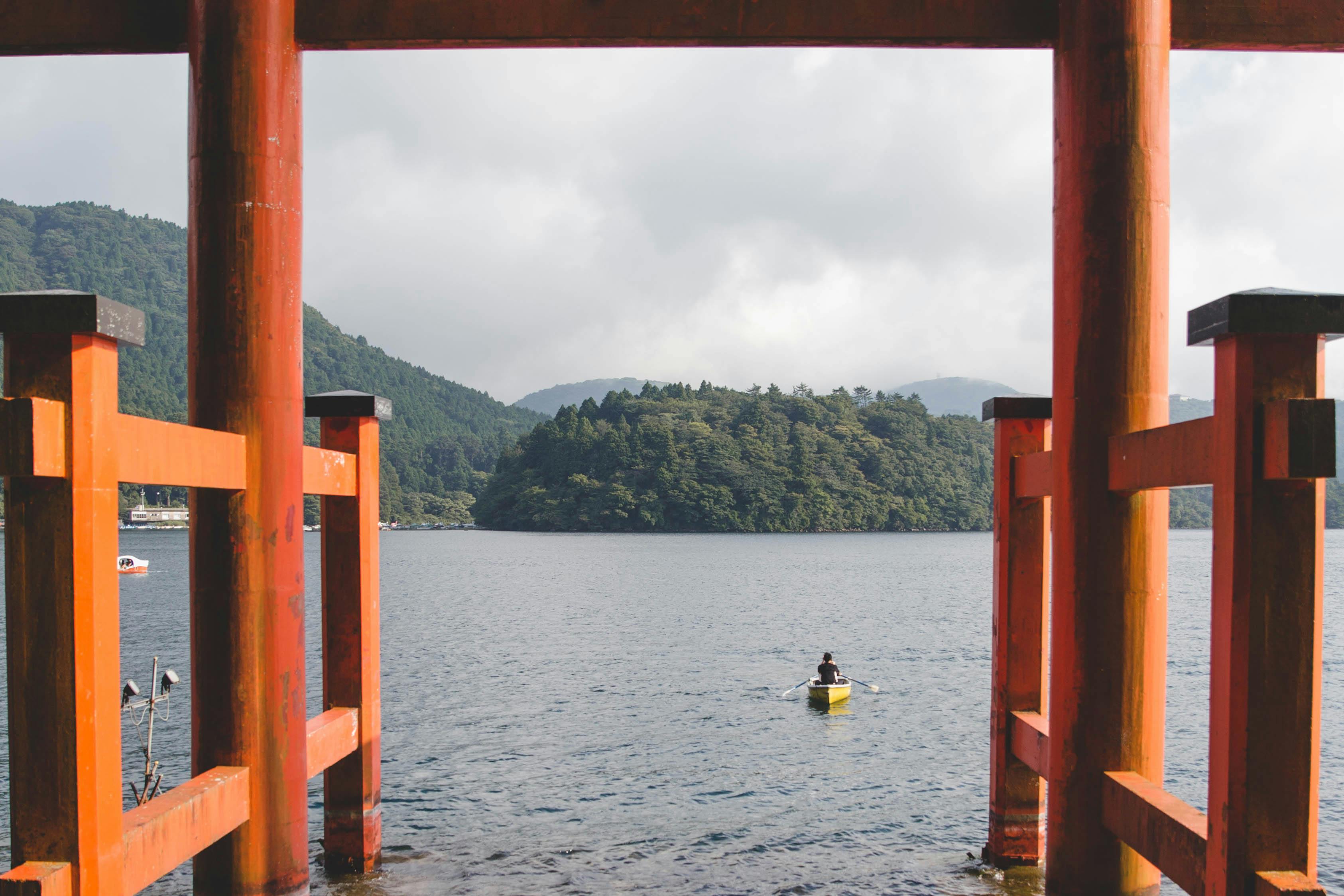 Kayak under Hakone Shrine's iconic torii gate on Lake Ashi.