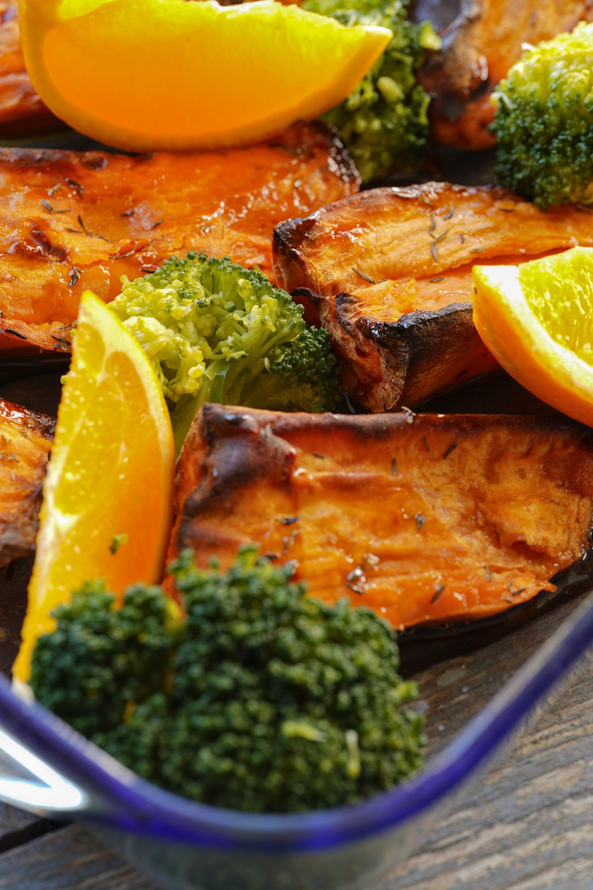 Roasted sweet potatoes with broccoli and oranges