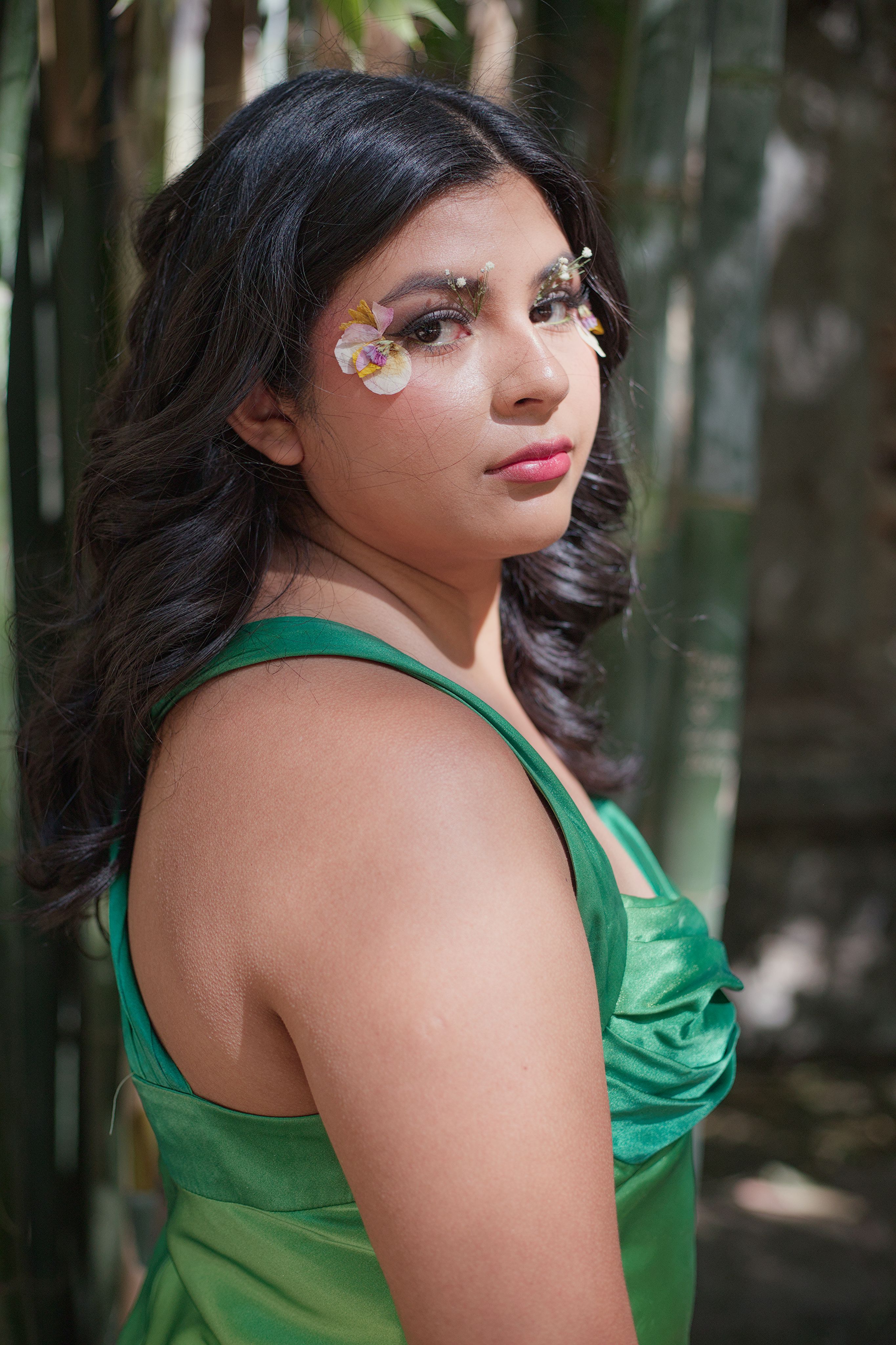 Portrait of Woman in Green Dress with Floral Makeup · Free Stock Photo