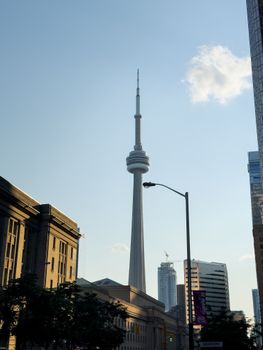 CN Tower in Toronto, Canada viewed from downtown area on a clear day.