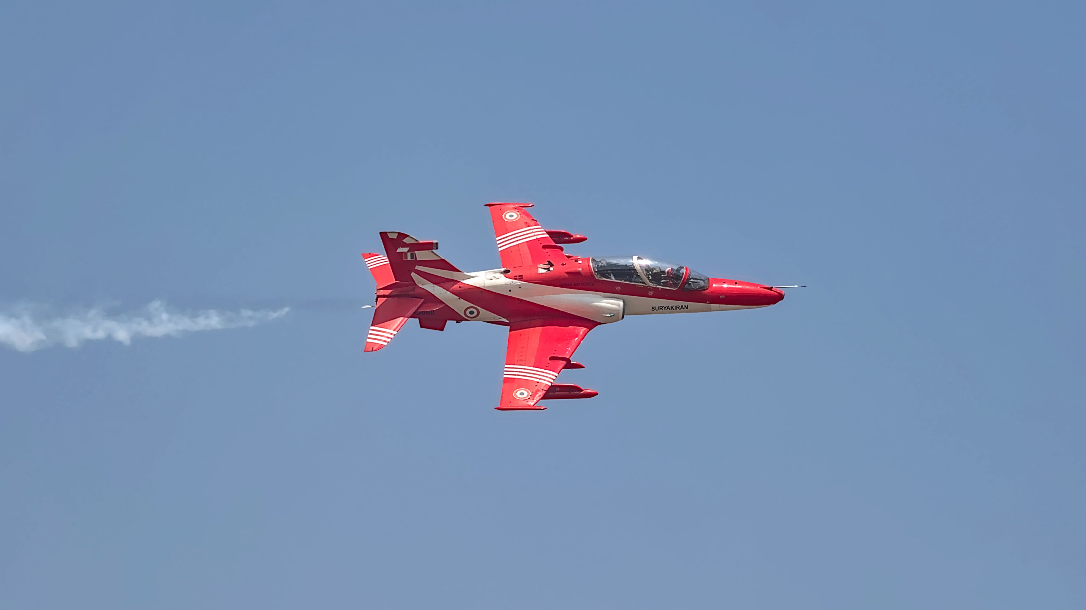 Indian Air Force Surya Kiran aircraft performing a breathtaking aerobatic display.