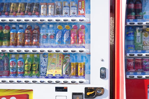 Vibrant vending machine in Kyoto showcasing diverse drink options. Captivating urban culture.