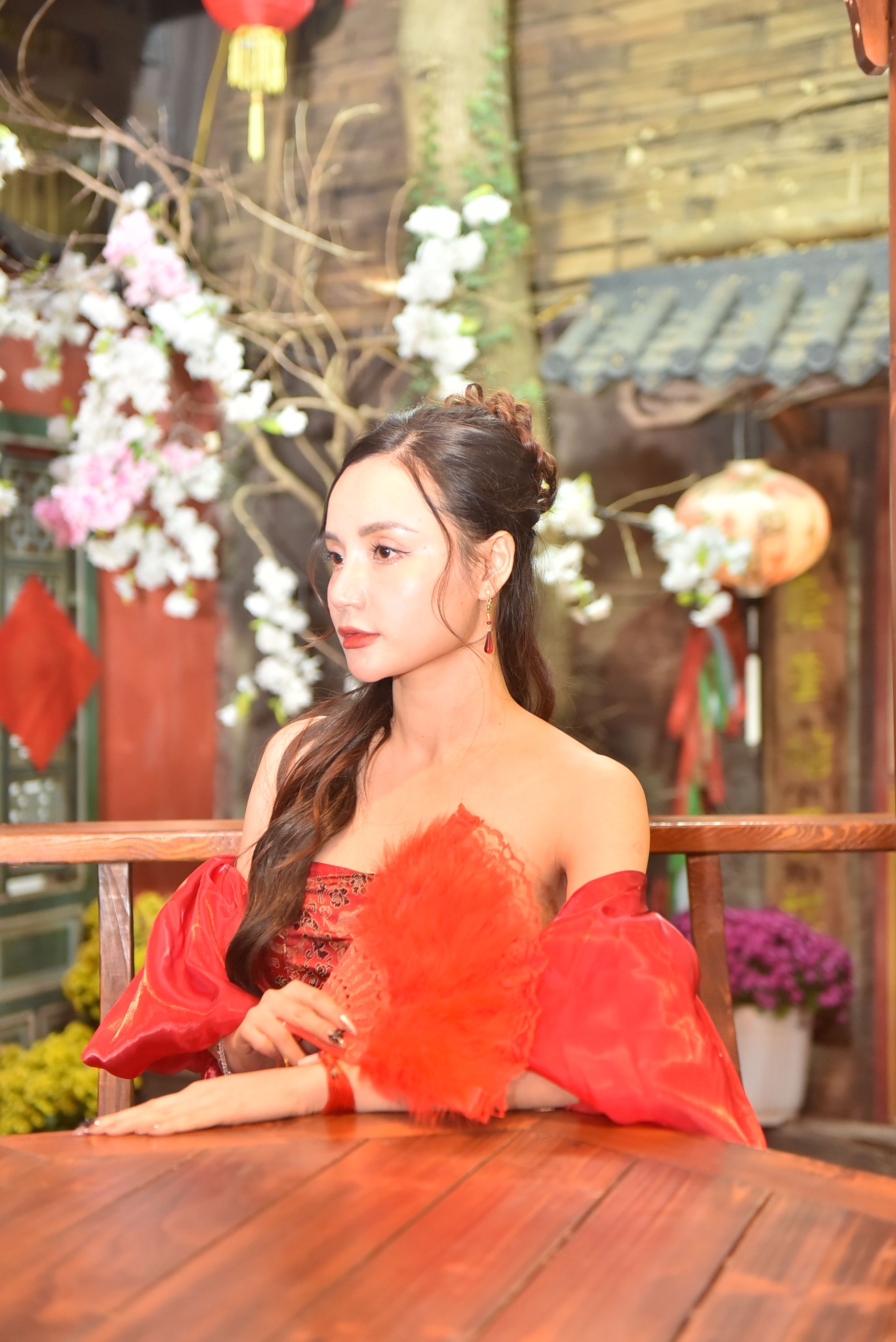 Elegant Woman in Traditional Asian Setting · Free Stock Photo