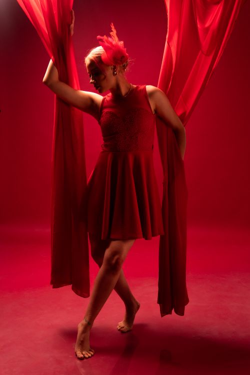 Elegant Ballerina in Red Dance Performance · Free Stock Photo