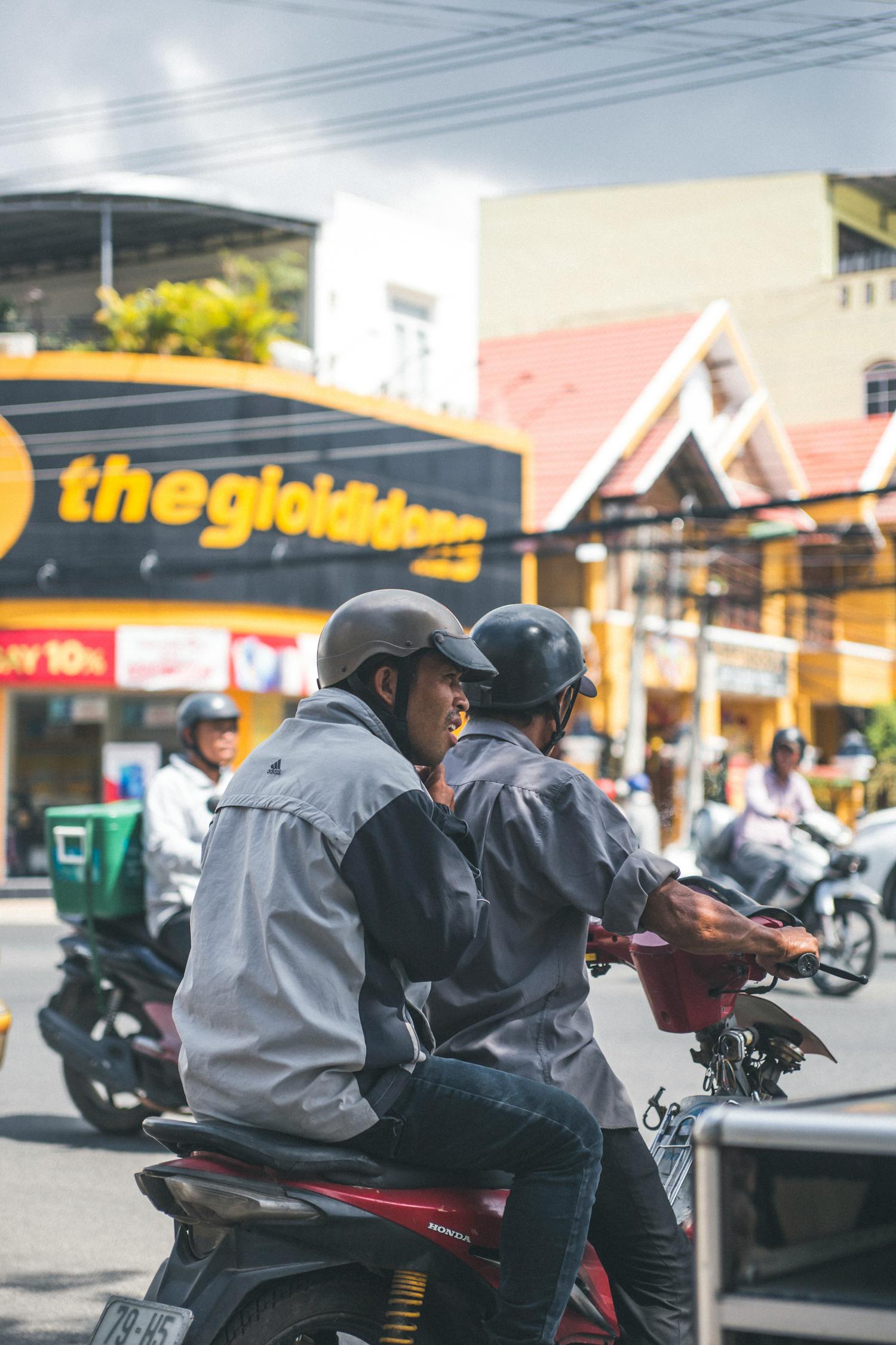 Two Men Riding on Motorcycle