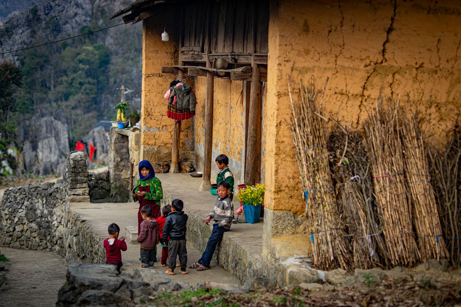 Daily life in a rural Ha Giang village showing slow travel and local culture